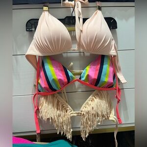 Lot of bikini tops. Striped is large but fits like medium